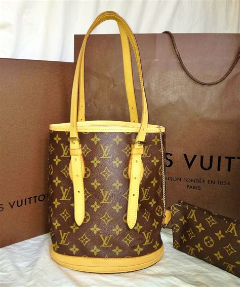 louis vuitton bucket bag real or fake|Louis Vuitton imposter handbags.